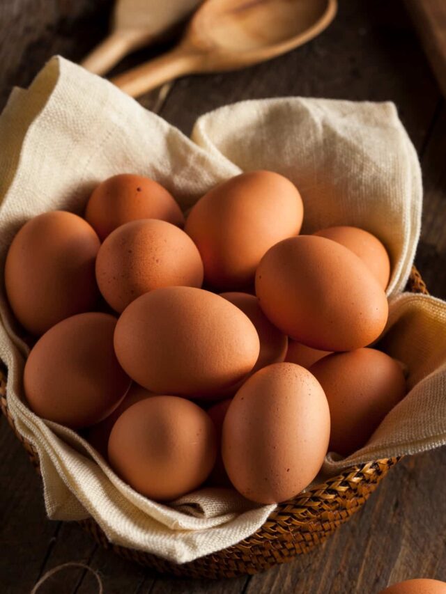 Raw Organic Brown Eggs in a Basket
